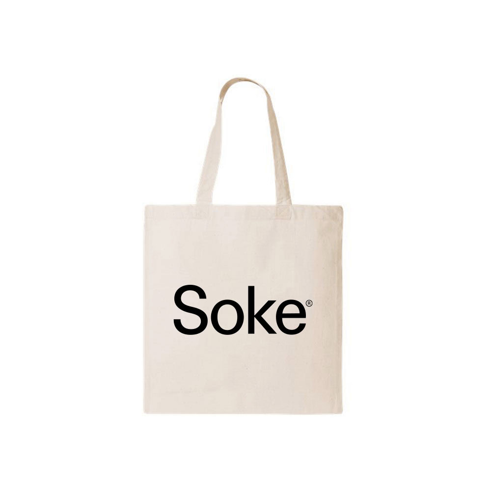 Soke Beauty minimalist canvas tote bag flat lay on white background.